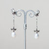 Pendientes Aprilla realizados a mano en plata con marcasitas y perlas de agua dulce